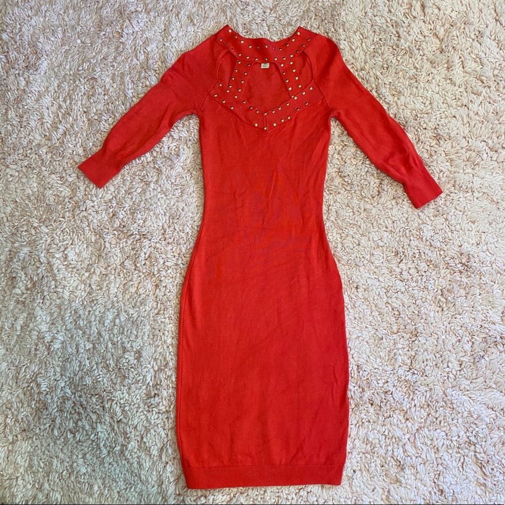 Coral form fitting Nicki Minaj dress